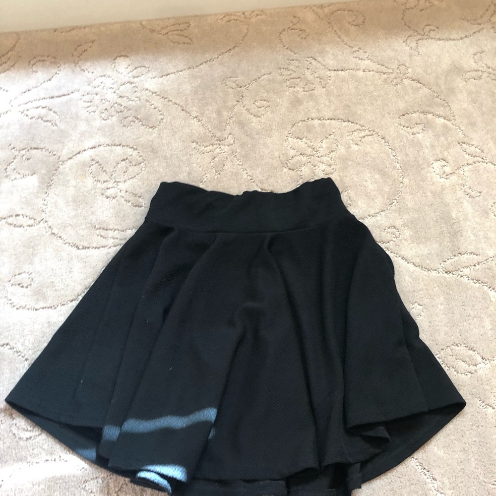 Girls large black skirt